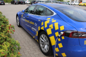 Fahrzeugbeschriftung Maingau Energie - Tesla Model S